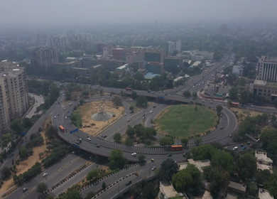 An aerial shot of the AIIMS flyover with running traffic in New Delhi, India