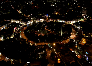 An aerial night hyperlapse shot of Connaught Place at New Delhi, India