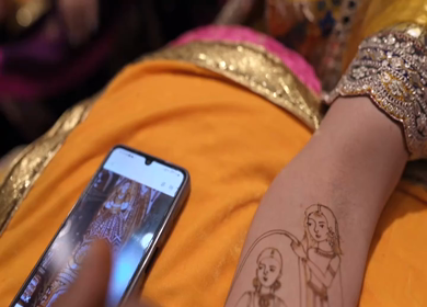 A Slow Motion Shot of Applying Mehndi on Bride's hand at her Indian Wedding in India