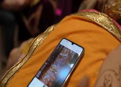 A Slow Motion Shot of Applying Mehndi on Bride's hand at her Indian Wedding in India
