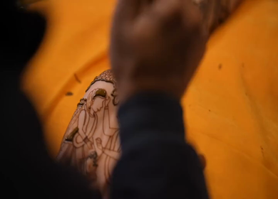 A Slow Motion Shot of Applying Mehndi on Bride's hand at her Indian Wedding in India