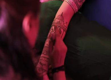 A Slow Motion Shot of Applying Mehndi on Bride's hand at her Indian Wedding in India