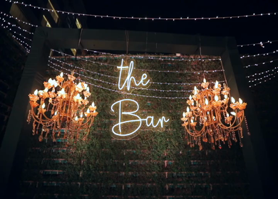 A slow motion shot of a bar being setup at an Indian wedding in New Delhi, India