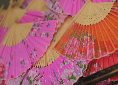 A shot of a collection of hand folded fans at an Indian Wedding 