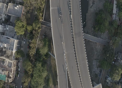 An aerial shot of Empty Road and People at New Delhi,India