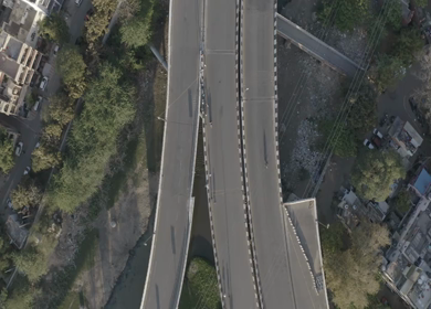 An aerial shot of Empty Road and People at New Delhi,India