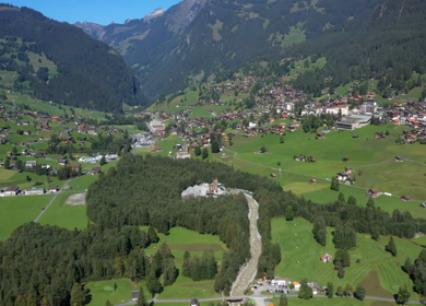 An Aerial Shot of a beautiful mountain scape at Grindelwald Village in Switzerland