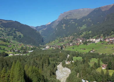 An Aerial Shot of a beautiful mountain scape at Grindelwald Village in Switzerland