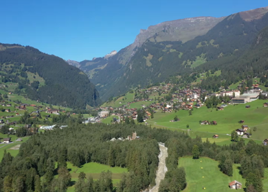 An Aerial Shot of a beautiful mountain scape at Grindelwald Village in Switzerland