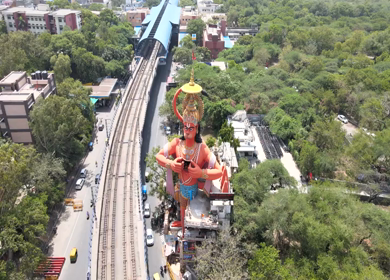 An Aerial Shot of Hanuman statue and Delhi Metro at Jhandewalah, New Delhi,India