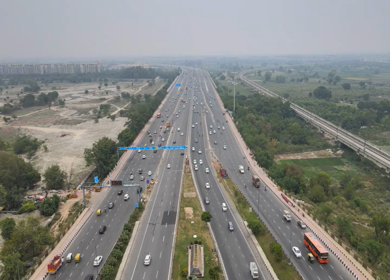 An aerial drone shot of the National Highway 24 in NCR, India