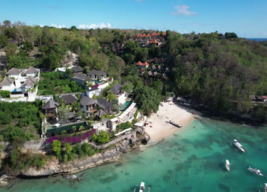 An Aerial shot of a beautiful beach tourquise water at Thailand