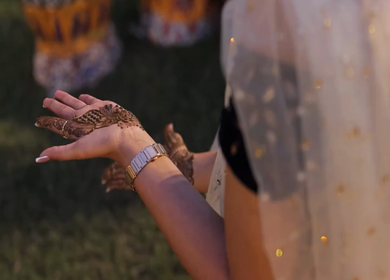 A Shot of Indian Bride showing Mehndi in her Hands at her Indian Wedding in New Delhi, India