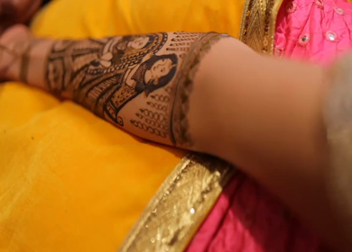 A Shot of Indian Bride showing Mehndi in her Hands at her Indian Wedding in New Delhi, India