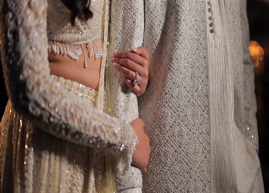 A Slow motion shot of a Indian Groom and Indian Bride posing towards camera at their Indian wedding in India