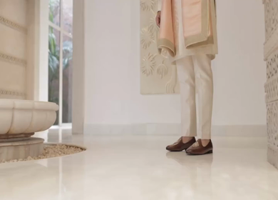 A shot of an Indian Groom posing for the photoshoot at his Indian Wedding