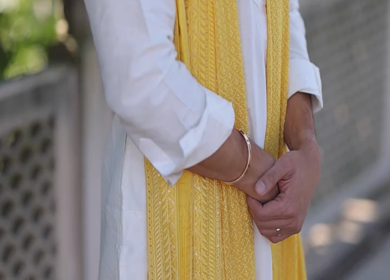 A shot of an Indian Groom posing for the photoshoot at his Indian Wedding