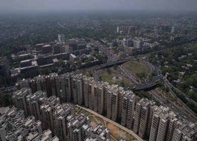 An aerial shot of the flyover with running traffic in New Delhi, India