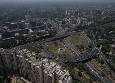 An aerial shot of the flyover with running traffic in New Delhi, India
