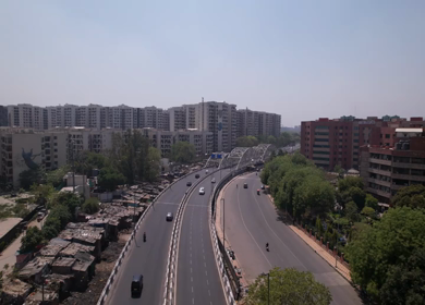 An aerial shot of the Traffic movement at Barah Pulla flyover in New Delhi, India 