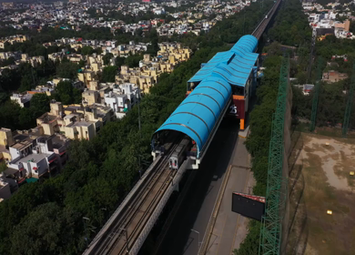 29th September 2020- An Aerial Shot of Delhi Metro leaving from Noida Golf Course metro station at Noida,NCR,India