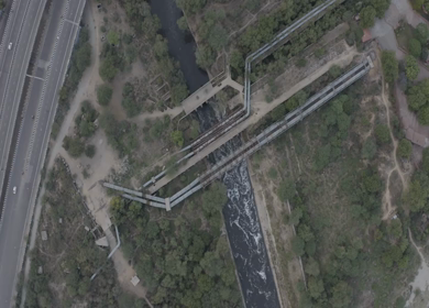 An aerial shot of water flowing by at Karnal Bypass in New Delhi
