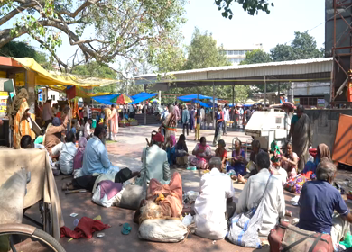A Timelapse shot of People and Beggars outside Hanuman Mandir