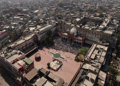 An aerial shot of Jama Masjid with people praying namaz in New Delhi,India