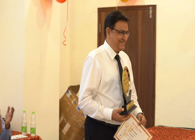 15th October 2021: A shot of a superior giving an award  at function at New Delhi,India