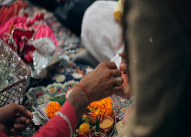 A shot of rituals being performed at an Indian Wedding in India