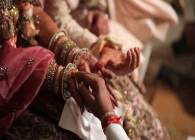 A shot of rituals being performed at an Indian Wedding in India