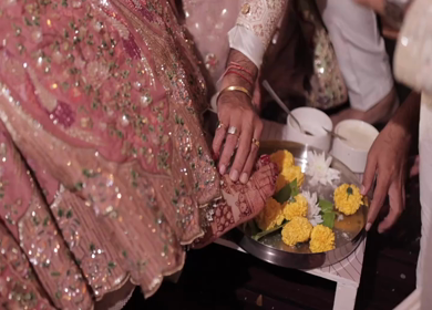 A Slow Motion Shot of an Indian Wedding where rituals are being performed in India