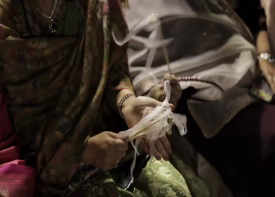 A Slow Motion Shot of an Indian Wedding where rituals are being performed in India