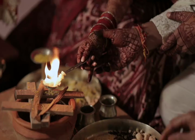 A Slow Motion Shot of an Indian Wedding where rituals are being performed in India