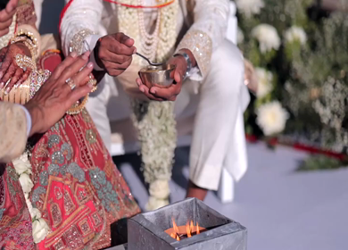 A Slow Motion Shot of an Indian Wedding where rituals are being performed in India
