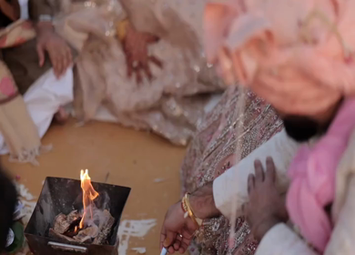A Slow Motion Shot of an Indian Wedding where rituals are being performed in India