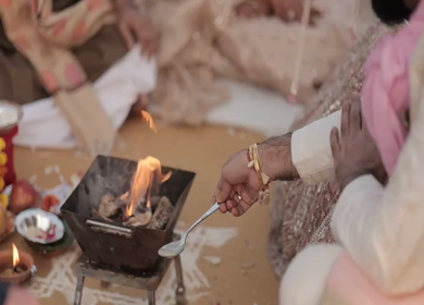 A Slow Motion Shot of an Indian Wedding where rituals are being performed in India