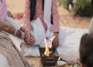A Slow Motion Shot of an Indian Wedding where rituals are being performed in India