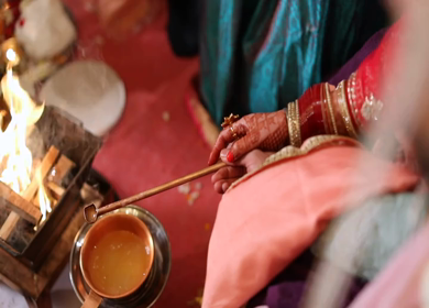 A Slow Motion Shot of Rituals being done with an Indian Couple at their Indian Wedding 