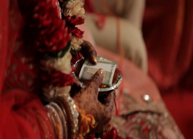 A Slow Motion Shot of Rituals being done with an Indian Couple at their Indian Wedding 