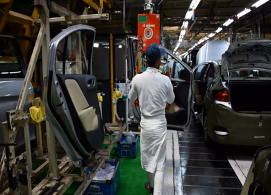 Greater Noida, CIRCA April 2017: Car doors being fixed in a car at car manufacturing plant in India