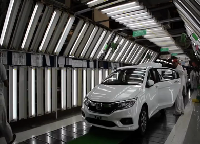 Greater Noida, CIRCA April 2017: Time lapse of final check of cars before dispatch at car manufacturing plant in India