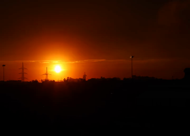 A timelapse shot of the sun setting over the ocean in India